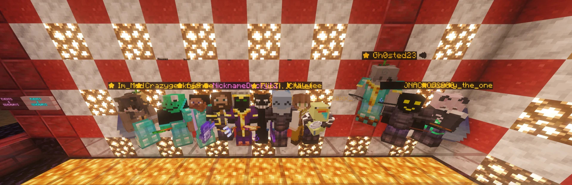 PureMC players lined up together against a glowing red and white wall